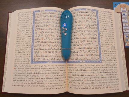 Talking Quran set with digital pen enabling instant audio playback for Quran reading and learning